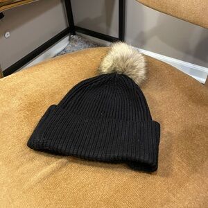 Black beanie with fur pom pom